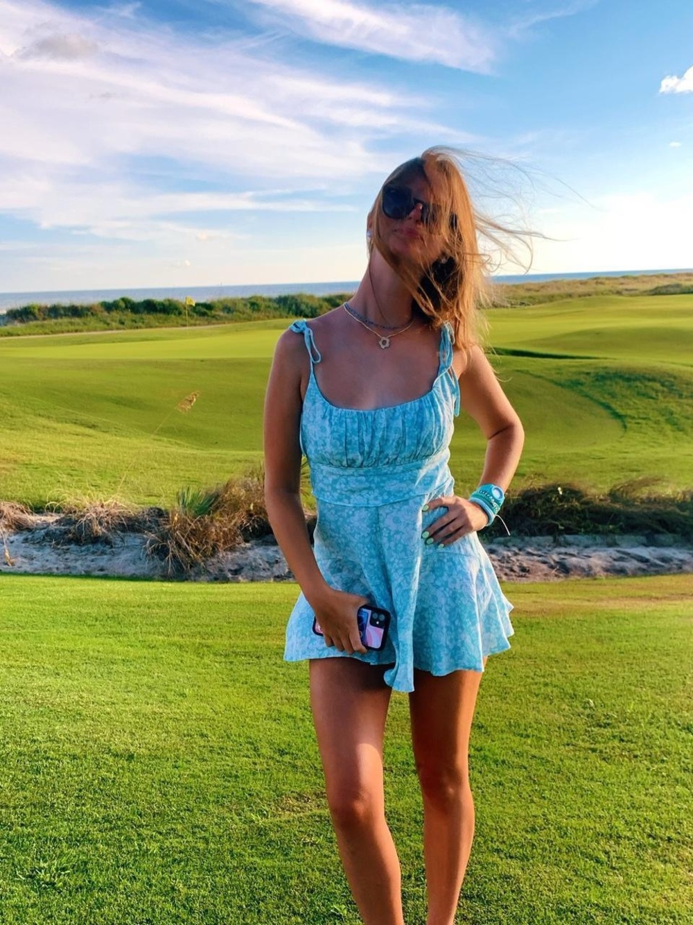 Isabelle’s Cabinet Sleeveless Light Blue Floral Romper with Tie Straps